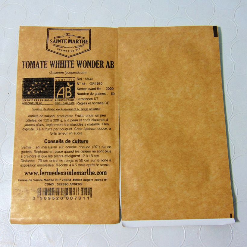 Exemple de spécimen de Tomate White Wonder Bio - Ferme de Sainte Marthe le sachet de 50 graines environ tel que livré
